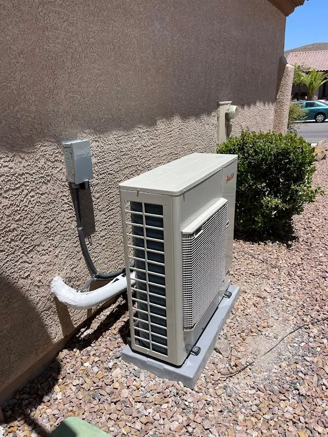 Residential air conditioning condenser unit in Spring Arbor
