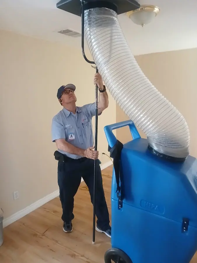 Mini Split Installation technician using HEPA equipment in Spring Arbor